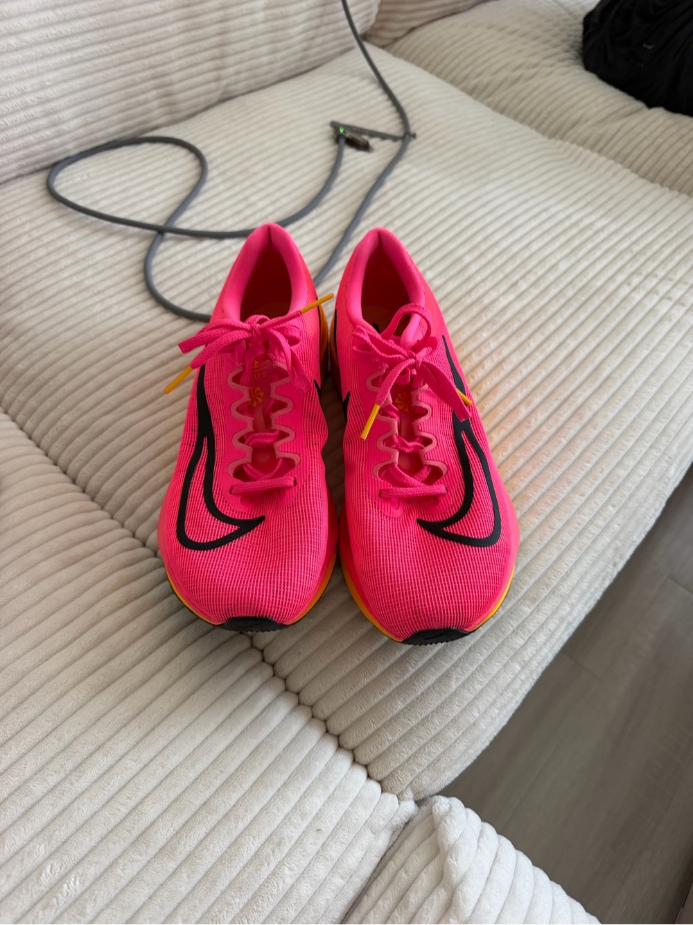 Nike Hot Pink Running Shoes with Black Swoosh and Yellow Accents